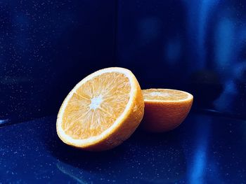 Close-up of orange slices on table