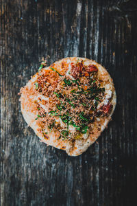 High angle view of pizza bread on table