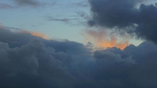 Low angle view of clouds in sky during sunset