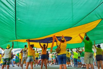 Low section of people under flag