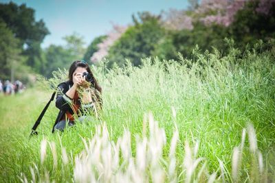 Young woman in field