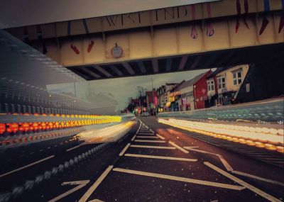 Illuminated light trails on road