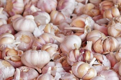 Full frame shot of onions for sale at market