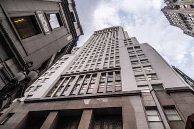 Low angle view of modern buildings in city