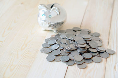 High angle view of coins on table