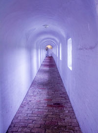 Empty corridor in tunnel