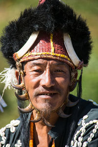 Close-up portrait of smiling mid adult man