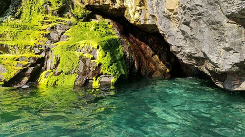 Scenic view of rock formation in sea