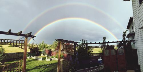 Rainbow over built structure