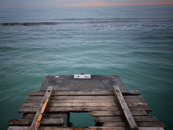 High angle view of pier over sea against sky