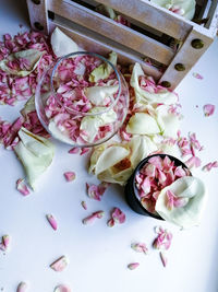 High angle view of pink roses on table