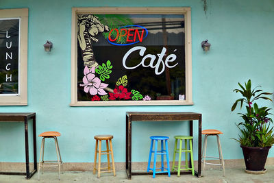 Empty chairs and tables in cafe