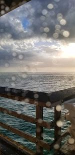 Close-up of wood against sea