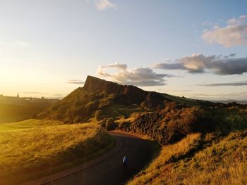 Road amidst landscape against sky