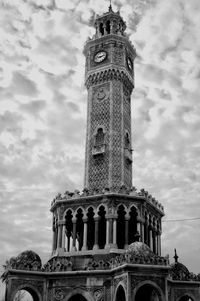 Low angle view of izmir clock tower against sky