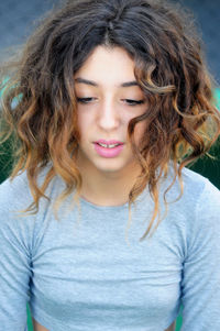 Close-up of girl with frizzy hair