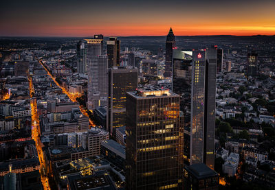 High angle view of city buildings during sunset