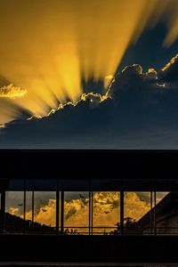 Scenic view of silhouette bridge against sky during sunset