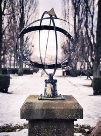 Close-up of metallic structure in park during winter