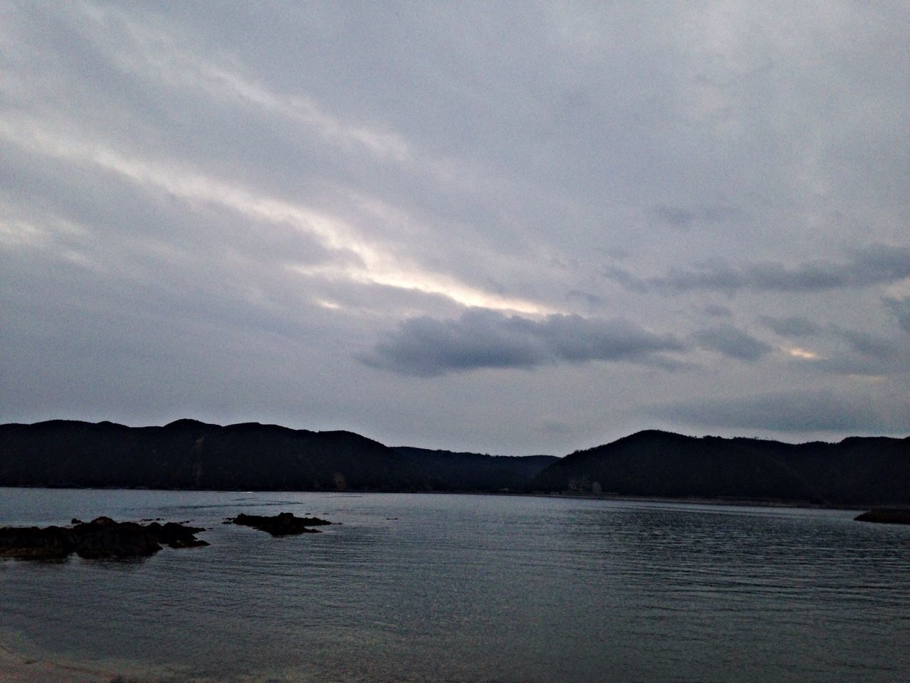 water, mountain, sky, tranquil scene, scenics, tranquility, mountain range, beauty in nature, waterfront, cloud - sky, lake, sea, silhouette, nature, nautical vessel, sunset, idyllic, cloud, reflection, dusk