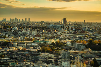 Cityscape against sky during sunset