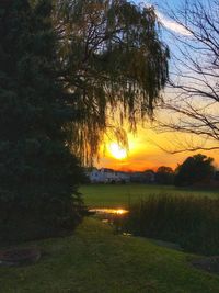 Scenic view of landscape against sky during sunset