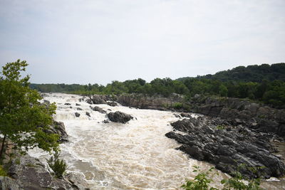 Scenic view of rocks against sky