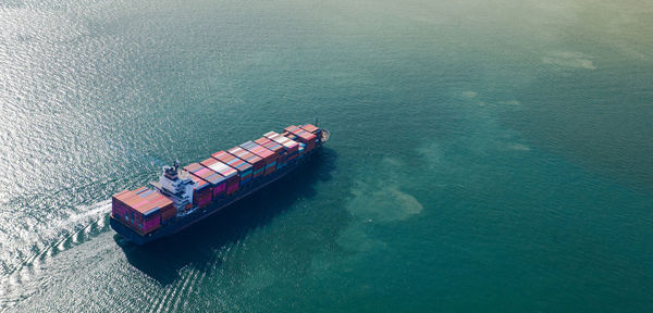 High angle view of ship sailing on sea