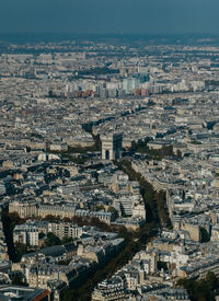 High angle view of city buildings against sky