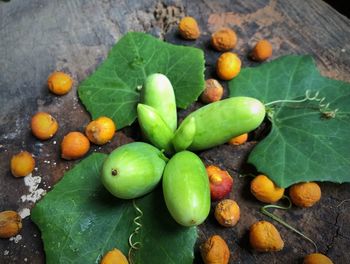 High angle view of fruits and leaves