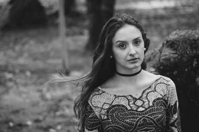 Portrait of beautiful young woman with long hair