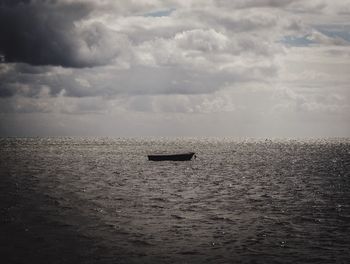 Boat sailing in sea