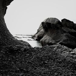 View of rocks against clear sky