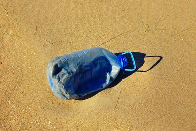 High angle view of blue umbrella on beach