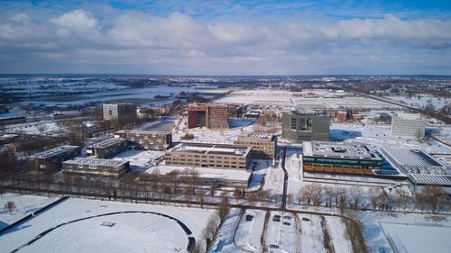 High angle view of buildings in city during winter