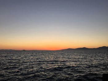 Scenic view of sea at sunset