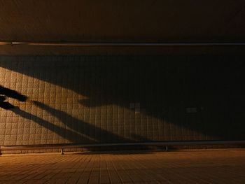 View of illuminated road at night