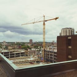 Construction site with buildings in background