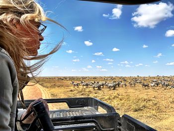 Side view of woman doing safari