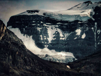 Scenic view of snow covered mountains