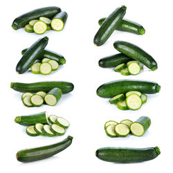 Green bell peppers on white background