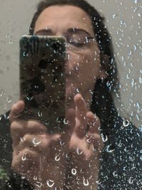 Portrait of woman photographing