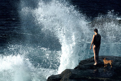 Man standing in sea