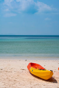 View of beach against blue sky