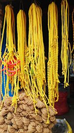 Close-up of multi colored ropes hanging on rope