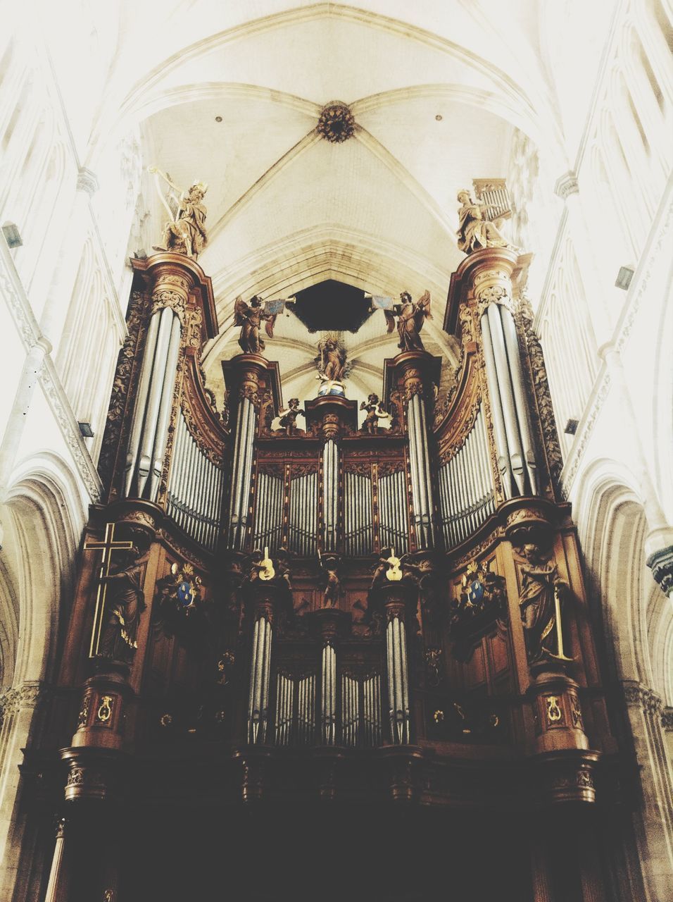 indoors, religion, place of worship, church, architecture, spirituality, ceiling, low angle view, arch, built structure, cathedral, interior, chandelier, architectural feature, ornate, illuminated, famous place, hanging