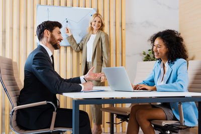 Business colleagues working at office