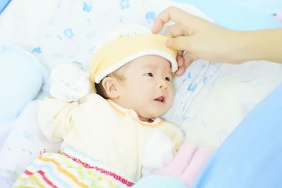 Cute baby sleeping on bed