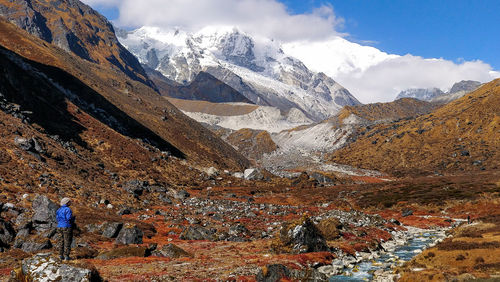 Scenic view of snowcapped mountains against sky