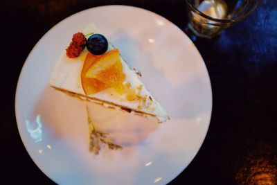 Close-up of cake served on table